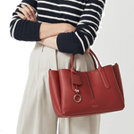 This Hillgate Place Rust Medium Grab Multiway Bag is by Radley