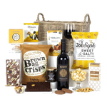 The Luxury Hamper by Virginia Hayward includes sweet and savoury snacks in a wicker basket.