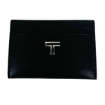 This TUMI black leather card holder comes with the branding on the front.