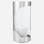 The Chrome Contours Medium Stainless Steel and Glass Hurricane Candleholder by Georg Jensen.