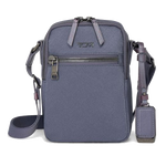 This TUMI Voyageur Blue Shimmer Persia Cross Body Bag has a front zip pocket with polished gunmetal trims.