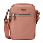 This TUMI Voyageur Dusty Pink Persia Cross Body Bag has a front zip pocket and a rear slip pocket.
