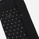 Close up of the BOSS 2-Pack of Regular Length Cotton Blend Black Socks with Three-Stripe Pattern.