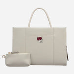 Back view of the Autumn Leaves Snow Medium Zip Top Multiway Bag.