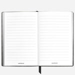 Inside the Small Black Croco-Embossed Leather Notebook with Lined Pages.