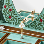 An alternate hand-painted ballet dancer figure from the Sleeping Beauty Ballet Musical Jewellery Box in Turquoise and Walnut Wood.