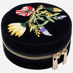 Side view of the Zoe Indigo Velvet Travel Round Jewellery Case.