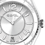 This Ebel watch has a silver dial with an arabic index with a white ceramic case with a rotating stainless steel bezel.