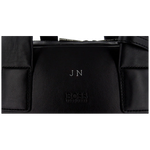 Leather embossing onto a HugoBoss Bag.