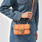 Radley's Hanley Close Apricot Mini Flap Over Bag can be worn as a crossbody bag and is adjustable to suit your desired length.