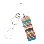 Paul smith's Signature Stripe Tag Metal Keyring is made out of brass and copper with an enamel inlay on the signature stripe pattern.