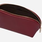 Inside the Commute Street Carmine Medium Cosmetic Pouch.