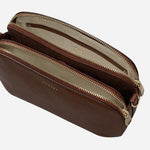 Inside the Dukes Place Textured Chocolate Brown Medium Zip Top Cross Body Bag.