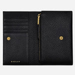 Inside the Oak Street Black Leather Medium Flapover Purse.