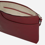 Inside the Pockets Carmine Red Leather Large Zip Top NS Cross Body Bag.
