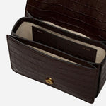 Inside The Belsize Dark Oak Faux Croc Leather Small Flapover Shoulder Bag.
