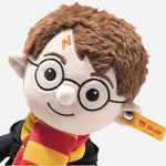 Face close-up of the 28 cm Harry Potter with Gryffindor Scarf and Hogwarts Outfit.