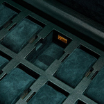 The WOLF 1834 Green British Racing 10 Piece Watch Box with Storage features gold hardware hinges.