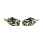 This pair of Paul Smith silver and gold cufflinks come in the shape of a snake head.