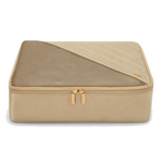 TUMI's Travel Access Gold Medium Packing Cube has polished gold trims including the brand name in gold lettering.