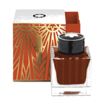 Montblanc's Meisterstück The Origin Collection Coral Ink Bottle, 50 ml has an art deco pattern on the packaging in gold and coral.