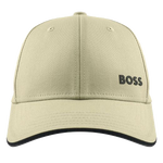 This BOSS Bold Cap in Beige with Contrast Black Piping has the logo which is slightly raised and rubberised.