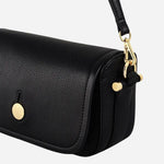 Side view of the Bathurst Mews Black Small Flapover Cross Body Bag.