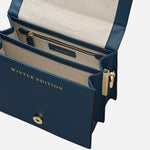 Inside the Book Street Winter Tales Teal Small Flapover Cross Body Bag.