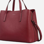 Side view of the Dukes Place Carmine Red Leather Medium Zip Top Multiway Bag.