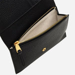 Zipped pocket of the Oak Street Black Leather Medium Flapover Purse.