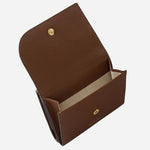 Inside the flapover coin pocket of the Pockets Chocolate Brown Small Trifold Purse.