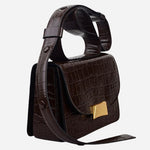 Side view of The Belsize Dark Oak Faux Croc Leather Small Flapover Shoulder Bag.