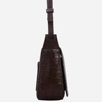 Side view of the Westwell Lane Faux Croc Dark Oak Small Flapover Cross Body Bag.