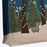 The Radley brand name on the front of the Winter Tales Teal Medium Open Top Canvas Tote Bag.