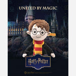 The 28 cm Harry Potter with Gryffindor Scarf and Hogwarts Outfit by Steiff.