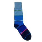 This Men's 3-Pack Navy Mixed Stripe Cotton Socks by Paul Smith has a dark navy pair with a mix of turquoise, burgundy, and white stripes with the Paul Smith brand name on the sole.