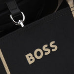 The BOSS logo on the Black and Beige Palmah Tote with Logo Straps.