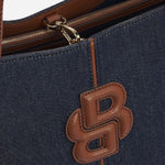 The BOSS logo on the Cotton-Denim Anett Tote Bag with Double 'B' Monogram.