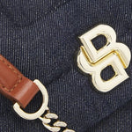 The BOSS logo on the Denim Quilted Shoulder Bag with Double 'B' Monogram.