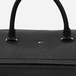 The BOSS logo embossed on the front of the Ray Black Faux Leather Soft Holdall.