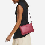 The Pockets Carmine Red Leather Medium Zip Top EW Cross Body Bag by Radley.