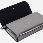 The base of the The Rathbone Silver Micro Flapover Cross Body Bag.