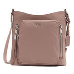 TUMI's Voyageur Mauve Tyler Crossbody Bag has polished silver hardware with the TUMI branding on the front.