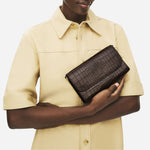 The The Rathbone Faux Croc Dark Oak Micro Flapover Cross Body Bag without cross body strap.