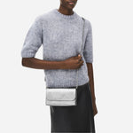 The The Rathbone Silver Micro Flapover Cross Body Bag by Radley.