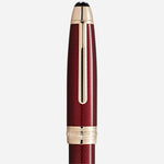 The cap and clip of the Burgundy Red Meisterstück Solitaire Golden Hour LeGrand Rollerball Pen.