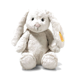 Steiff's Light at Night Hoppie Rabbit in Light Grey is made out of soft plush with a removable night light that has a timer function.