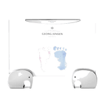 This Georg Jensen Elephant Picture Frame 4x6 IN has two elephants holding the clear frame.