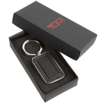The black leather Alpha Tracer rectangle keyring by TUMI comes inside its own presentation box.