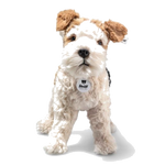 Steiff's Soft Cuddly Friends Foxy Fox Terrier 32 cm is made of soft plush with a white and brown coat.